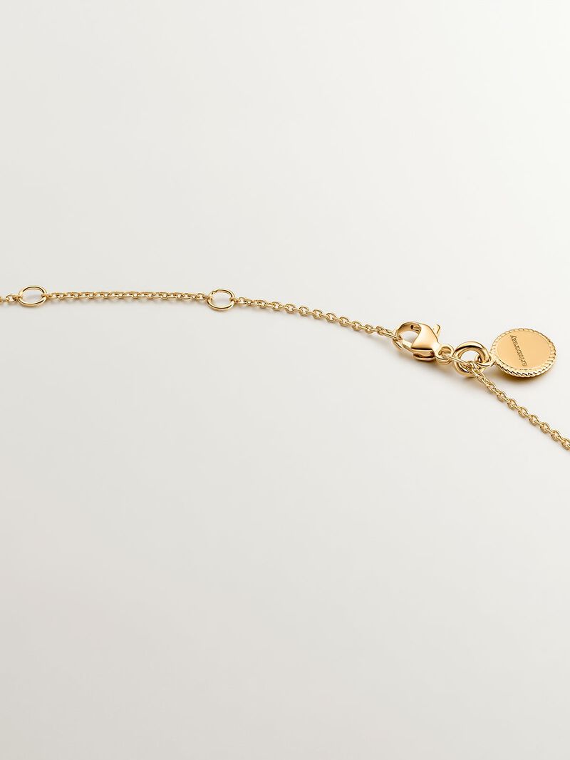 925 Silver pendant dipped in 18K yellow gold featuring a cross and white topazes. image number 6
