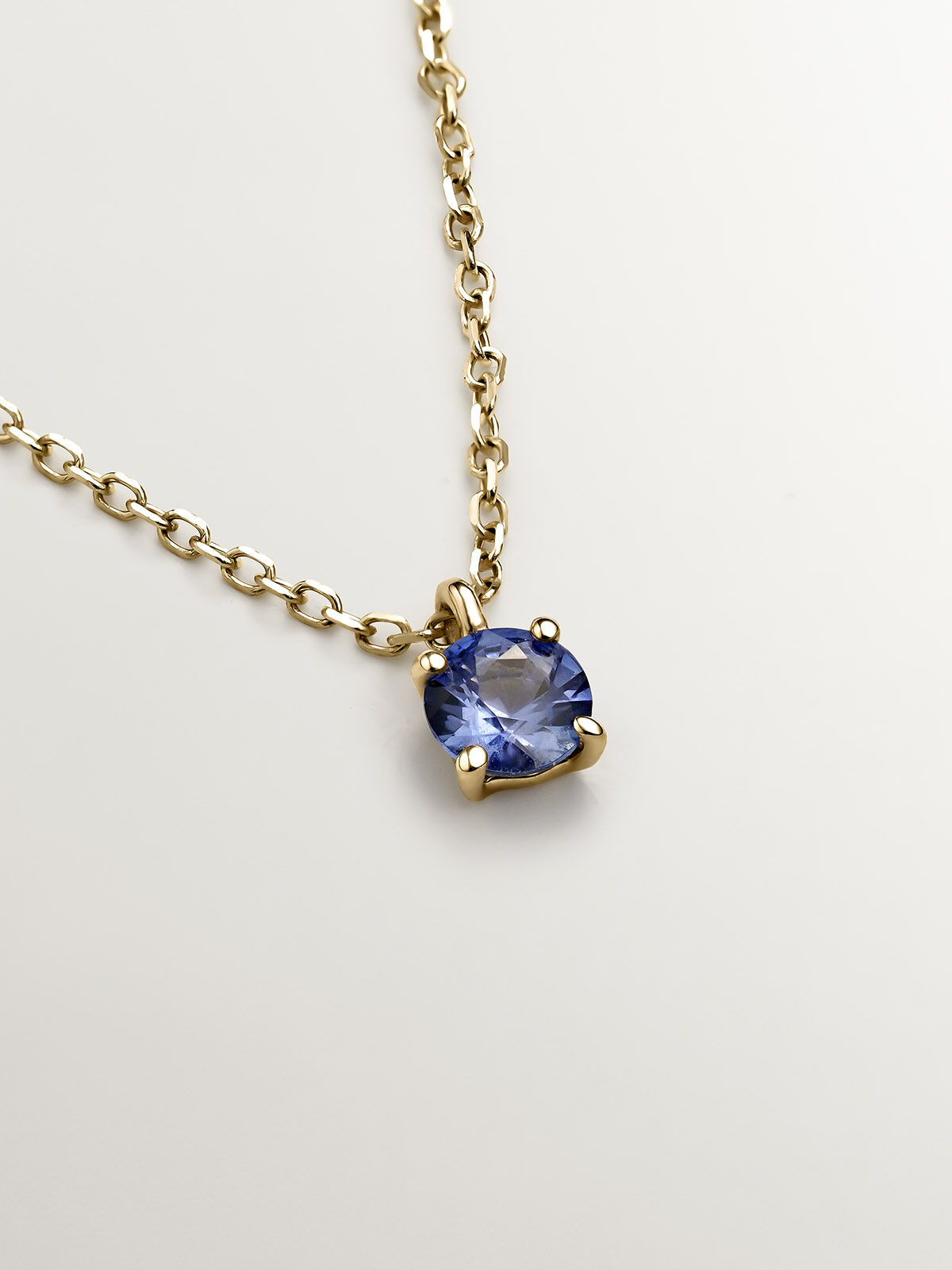 Sapphire pendant sales yellow gold