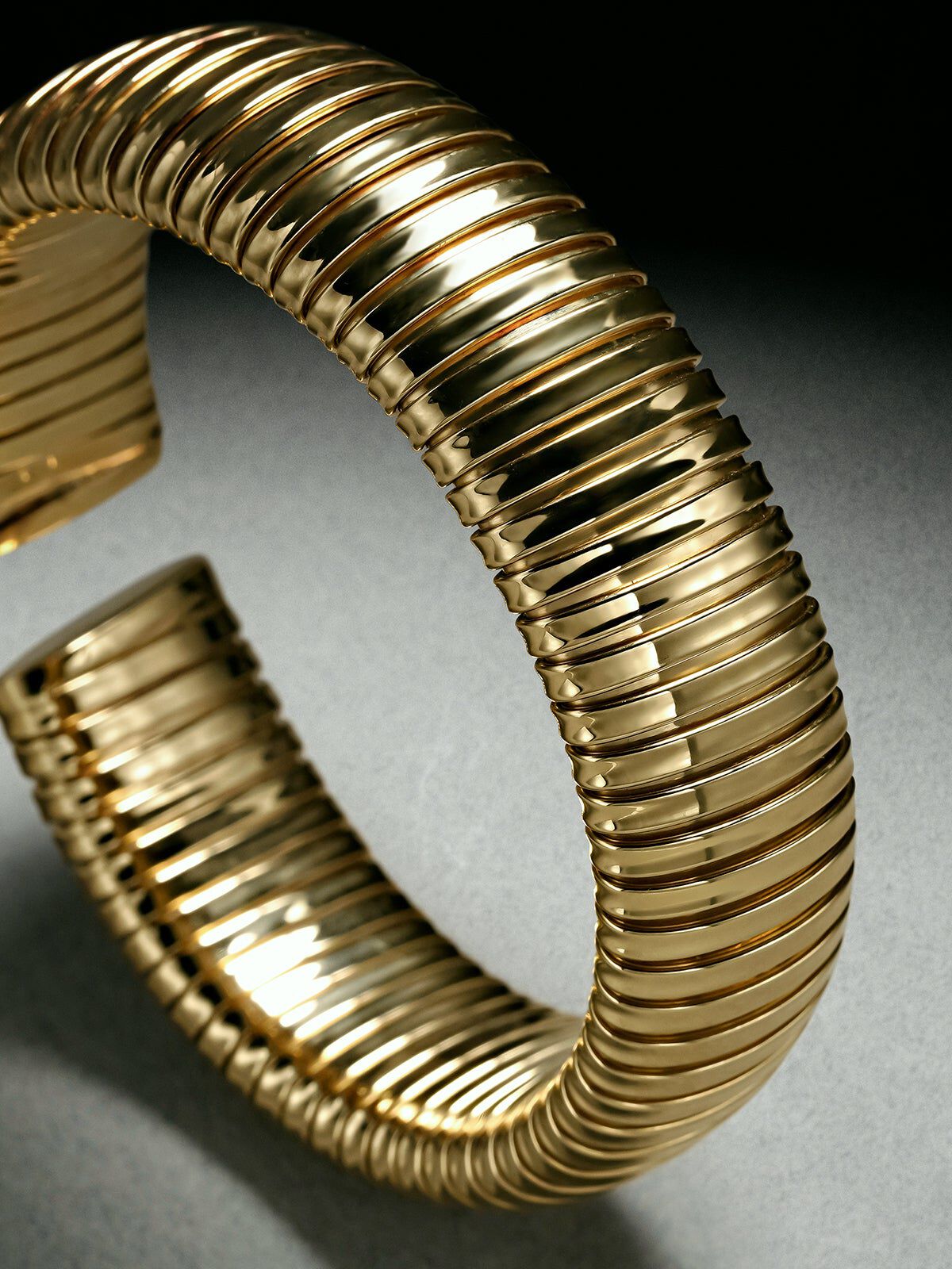 Tubogas M bracelet in 925 sterling silver plated with 18K yellow