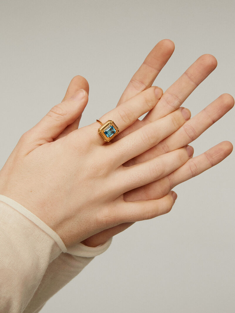 931 Silver ring bathed in 18K yellow gold with Swiss blue topaz image number 1