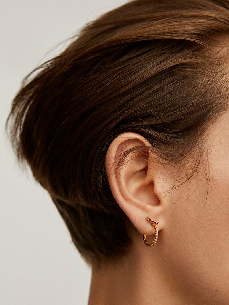 Small hoop earrings made of 925 silver, coated in 18K yellow gold with white topaz and pink rhodolites. image number 1
