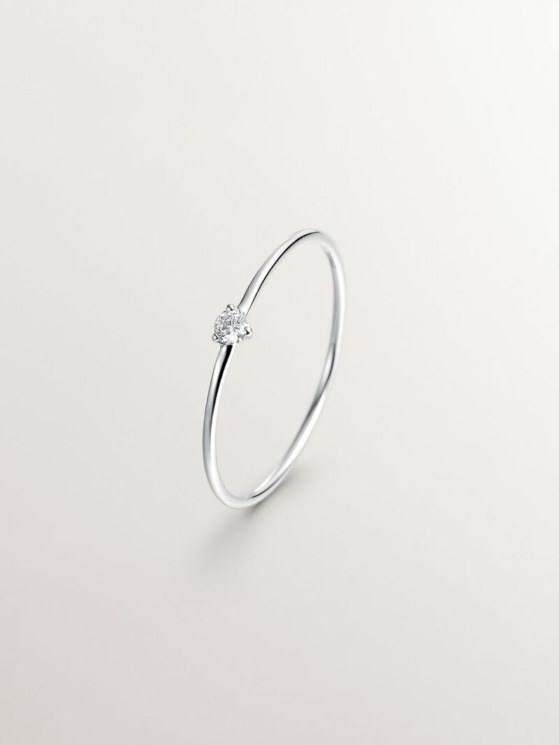 18K white gold solitaire ring with a 0.048ct diamond. image number 0