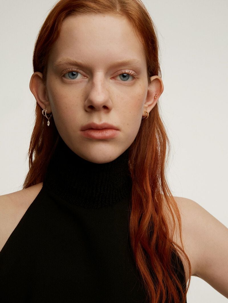 Small double hoop earrings made from 925 silver bathed in 18K yellow gold with embossing and white topazes. image number 5