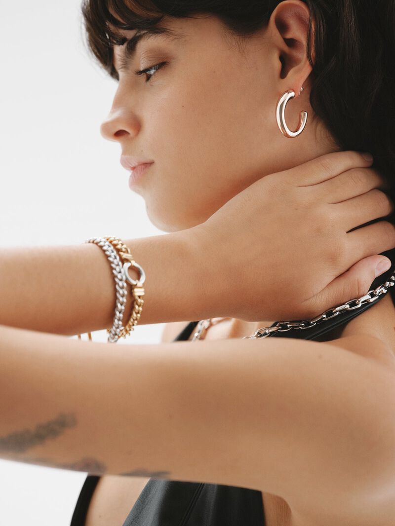 Large and thick 925 silver hoop earrings bathed in 18K rose gold with an oval shape. image number 5
