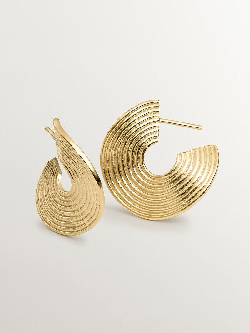 Medium sized hoop earrings made of 925 silver, bathed in 18K yellow gold with texture and irregular shape. image number 2