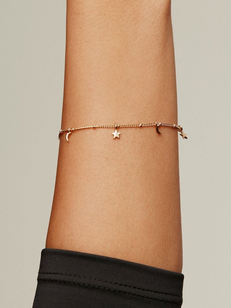 925 Silver bracelet bathed in 18K yellow gold with moons and stars. image number 1