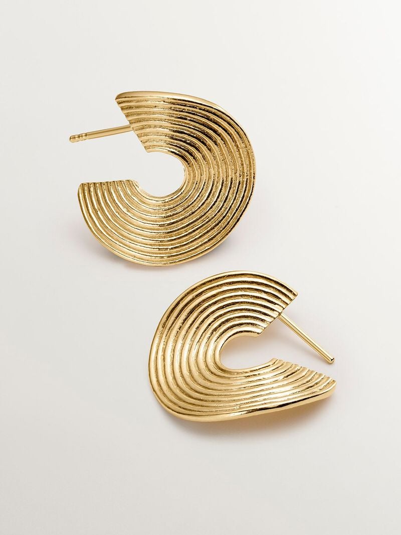 Medium sized hoop earrings made of 925 silver, bathed in 18K yellow gold with texture and irregular shape. image number 0