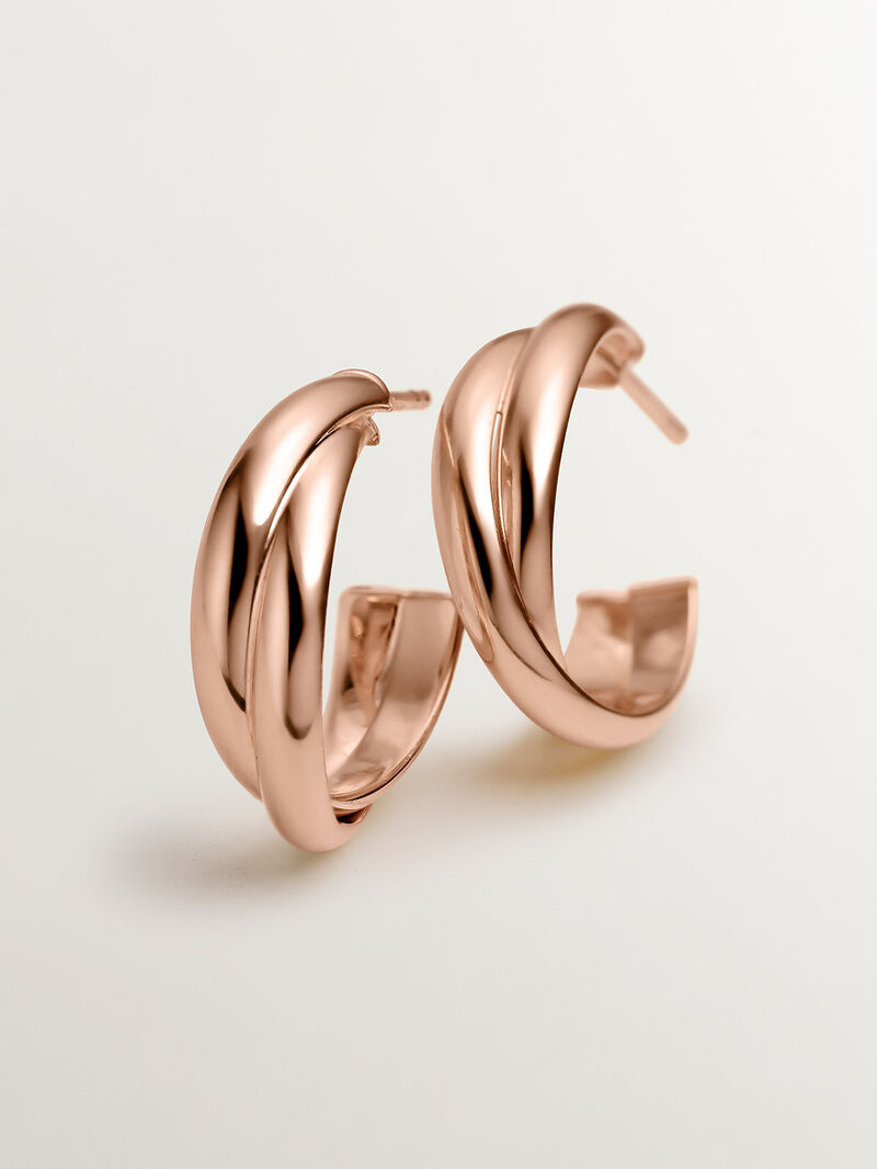 Medium double hoop earrings made of 925 silver, coated in 18K rose gold. image number 4
