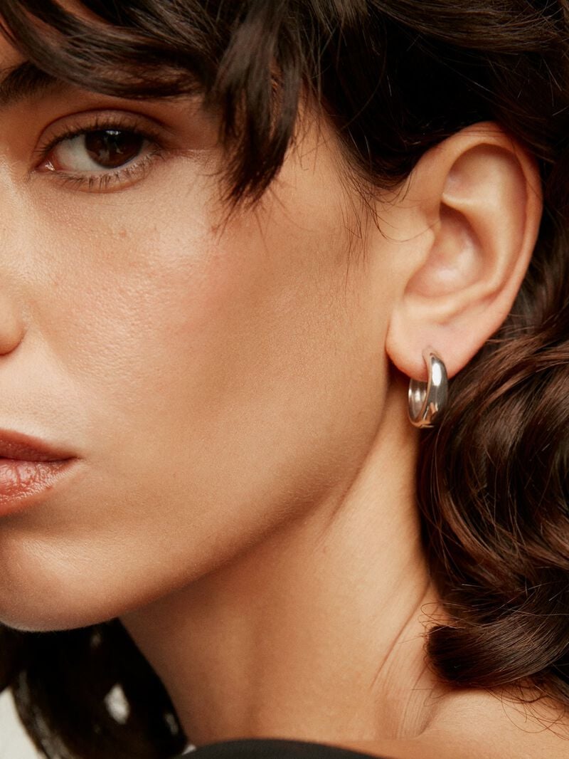 Medium thick 925 silver hoop earrings. image number 1