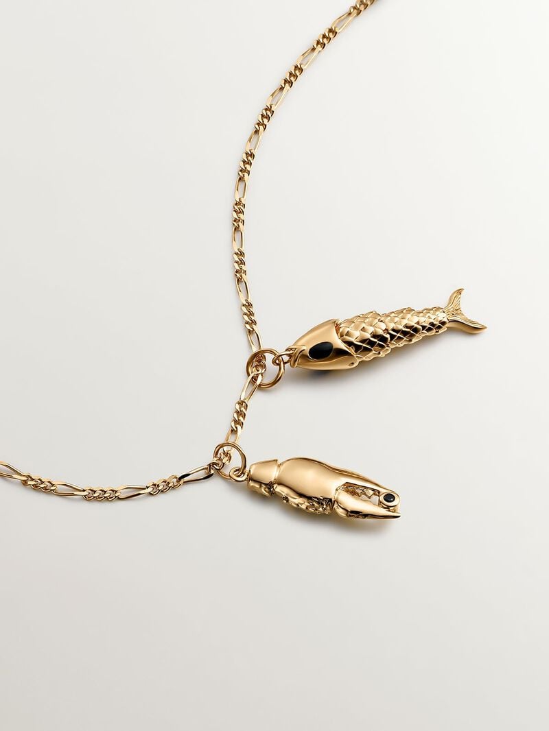 925 Silver charm bathed in 18K yellow gold with black enamel and fish shape. image number 6