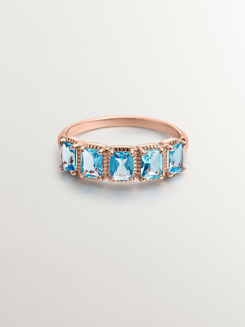 931 Silver ring coated in 18K rose gold with Swiss blue topaz. image number 4