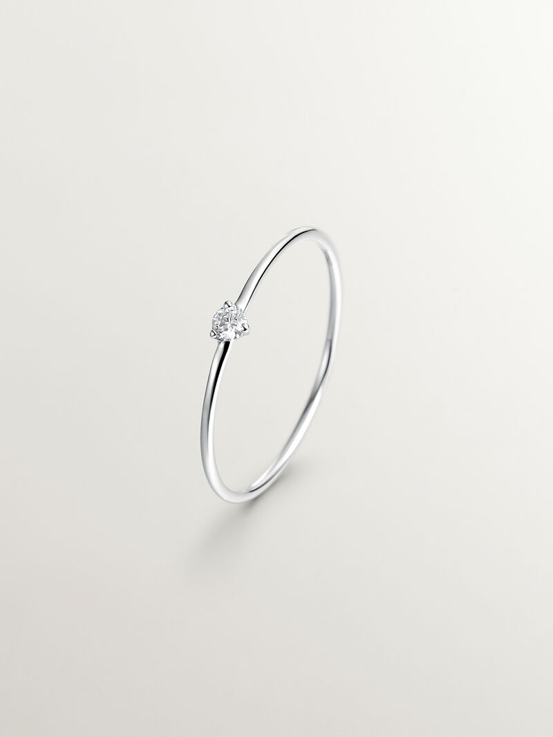 18K white gold solitaire ring with a 0.048ct diamond. image number 0