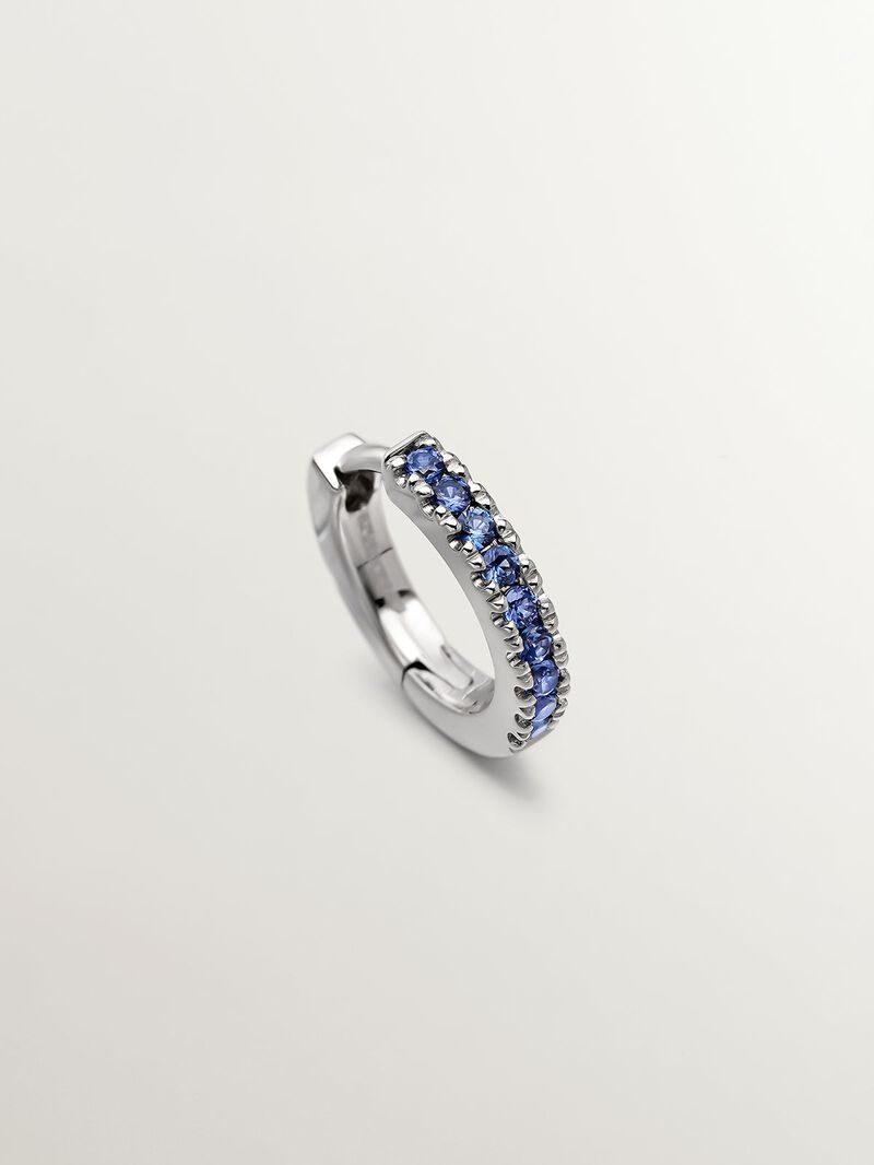 Individual 9K white gold hoop earring with blue sapphires. image number 0