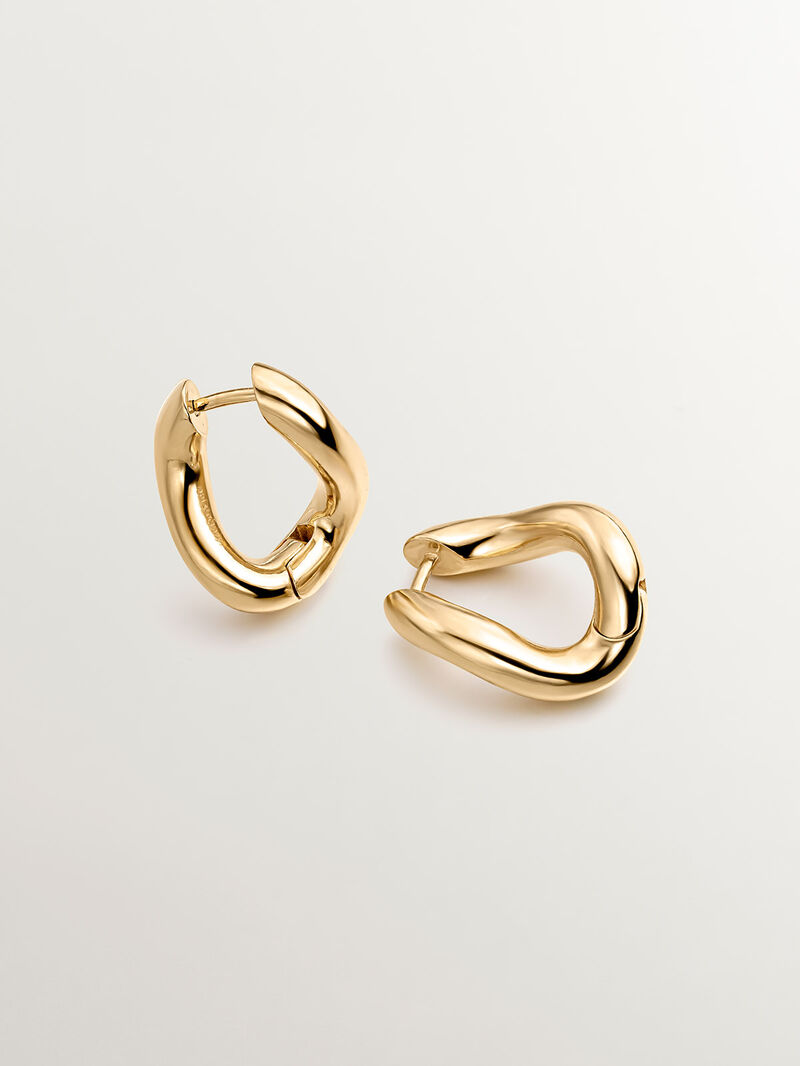 Medium thick 925 silver hoop earrings bathed in 18K yellow gold with a wavy shape. image number 2