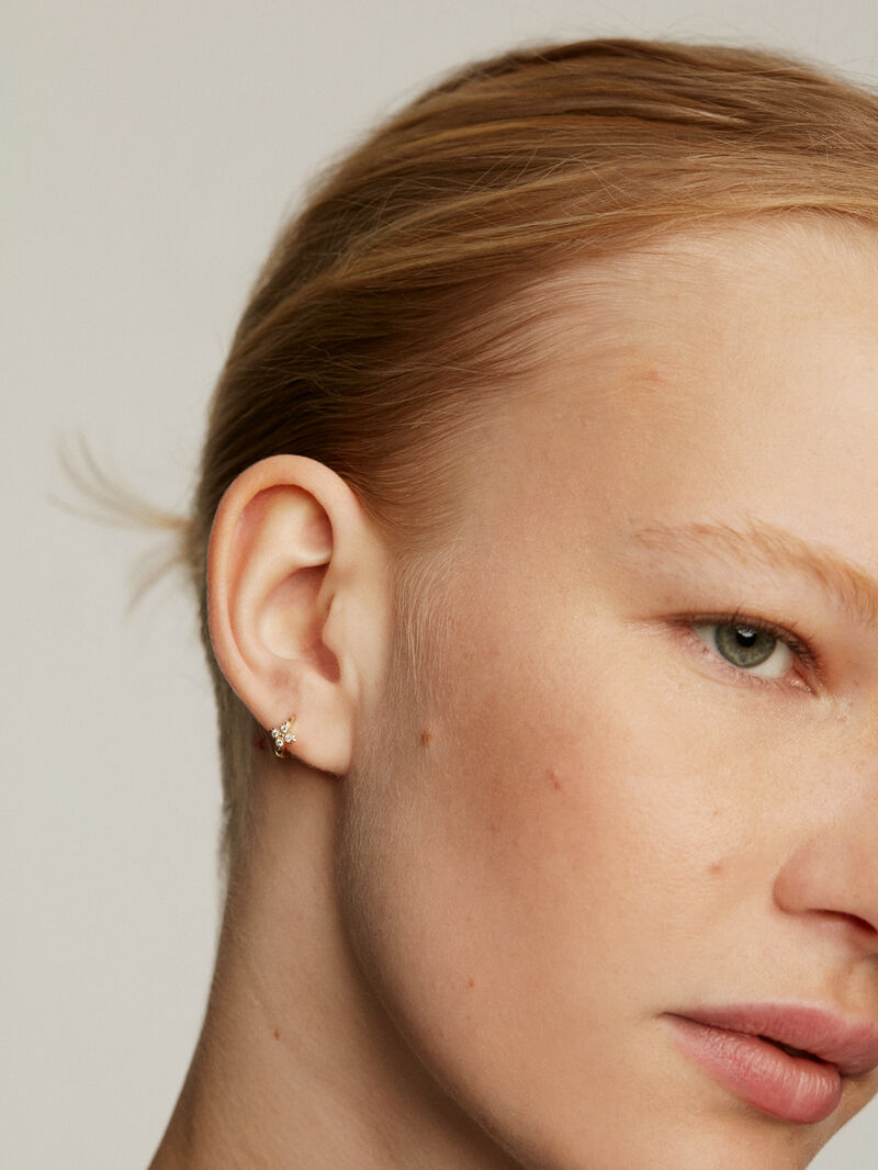Individual small hoop earring made of 9K yellow gold with a diamond cross image number 3
