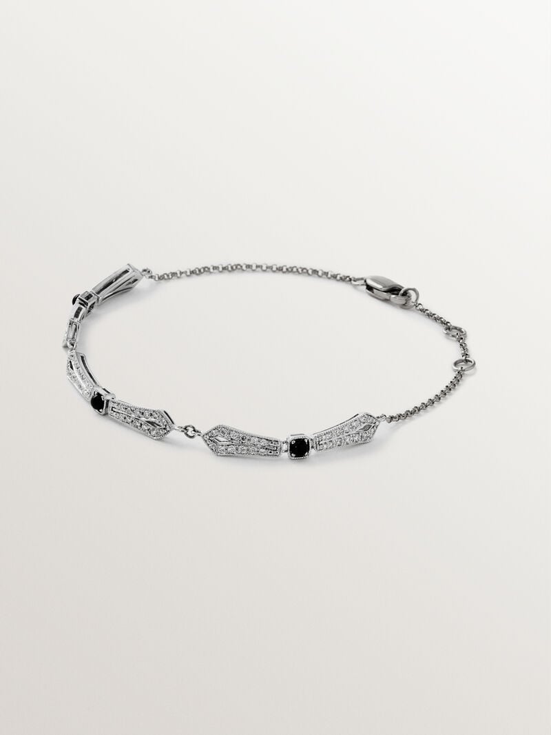 Pulsera de oro blanco de 18K con ónix negro y diamantes en talla brillante image number 0