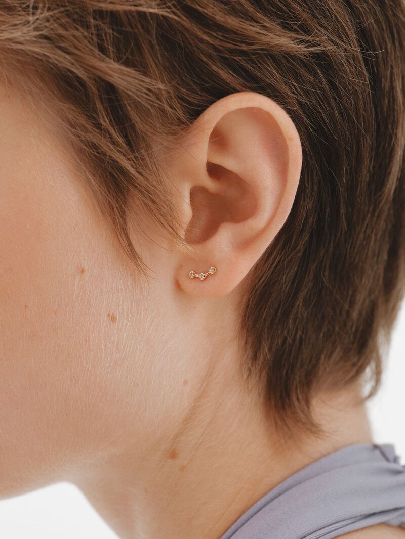 Single climbing earring made of 925 silver coated in 18K yellow gold with white topaz. image number 1