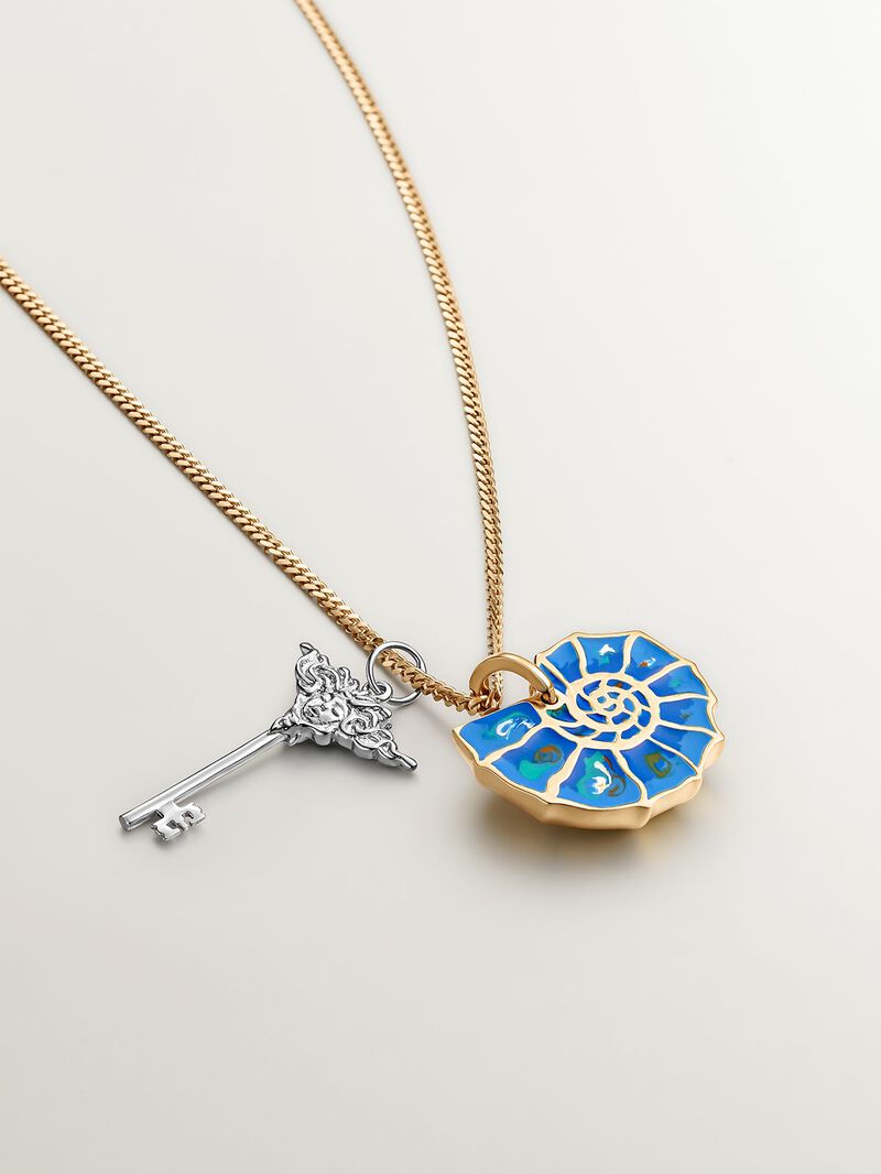 925 silver charm plated in 18K yellow gold with blue enameling and white topazes shaped like a shell. image number 4