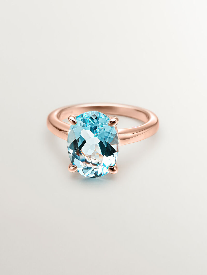931 Silver ring coated in 18K rose gold with sky blue topaz image number 2