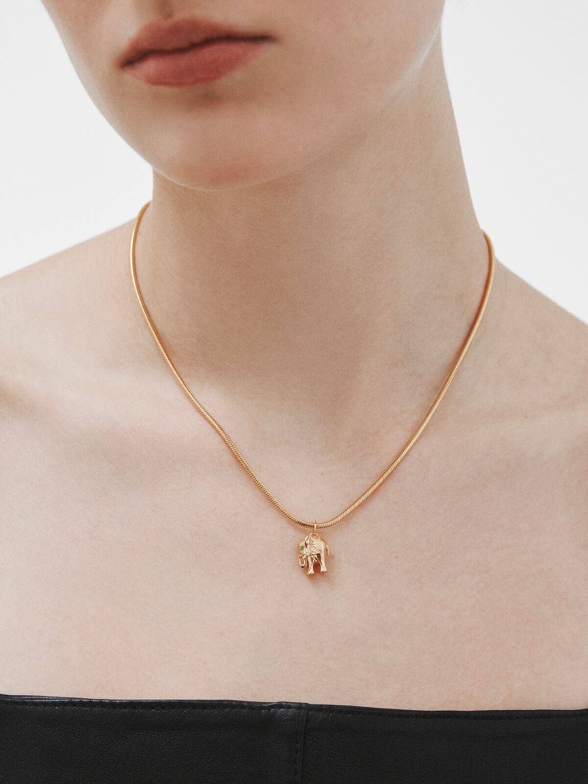 925 silver charm bathed in 18k yellow gold with green ónix and elephant  shape | Aristocrazy