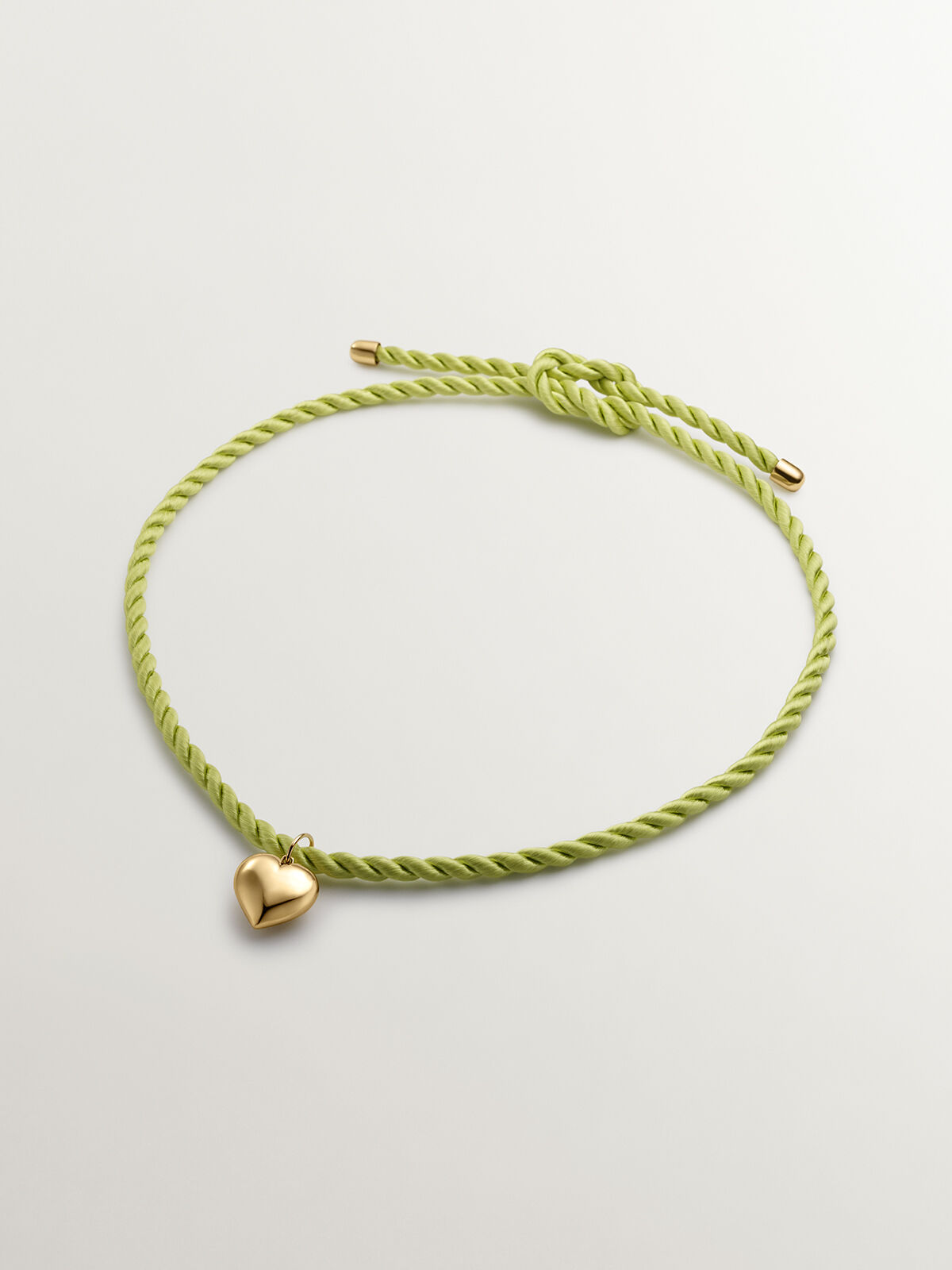Silk cord necklace with gold clasp top