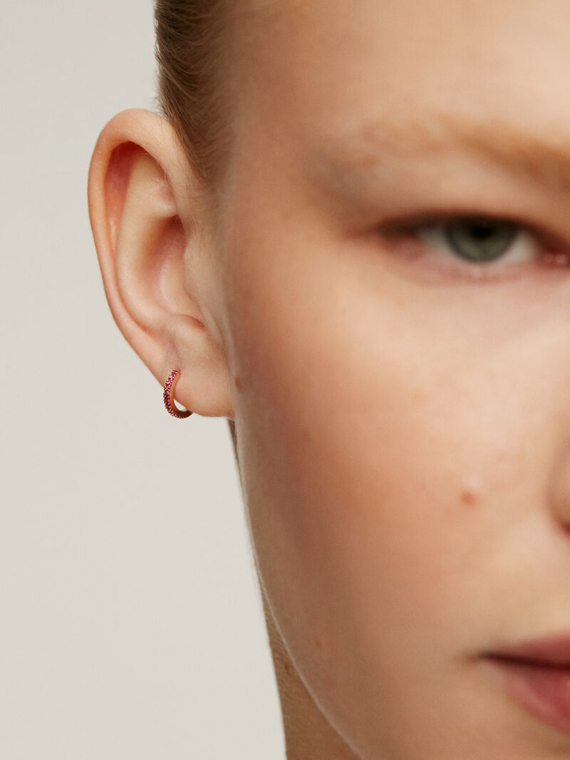 Single small hoop earring in 9k rose gold with rubies. image number 3