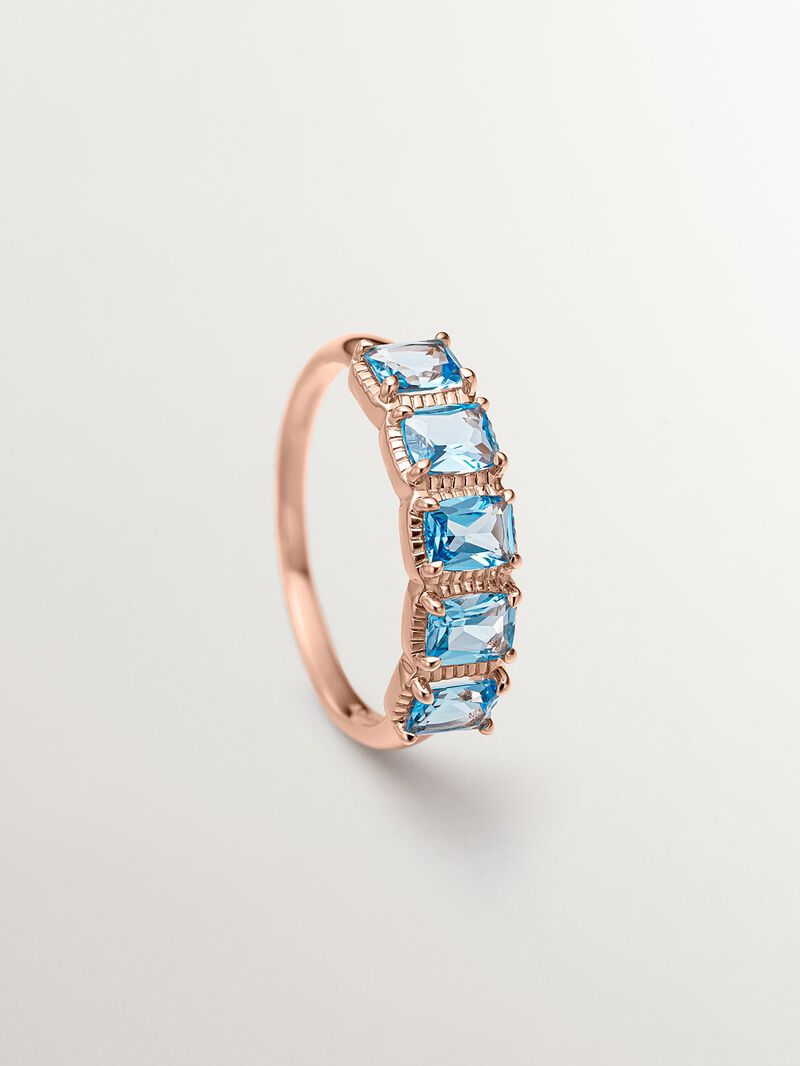 931 Silver ring coated in 18K rose gold with Swiss blue topaz. image number 2