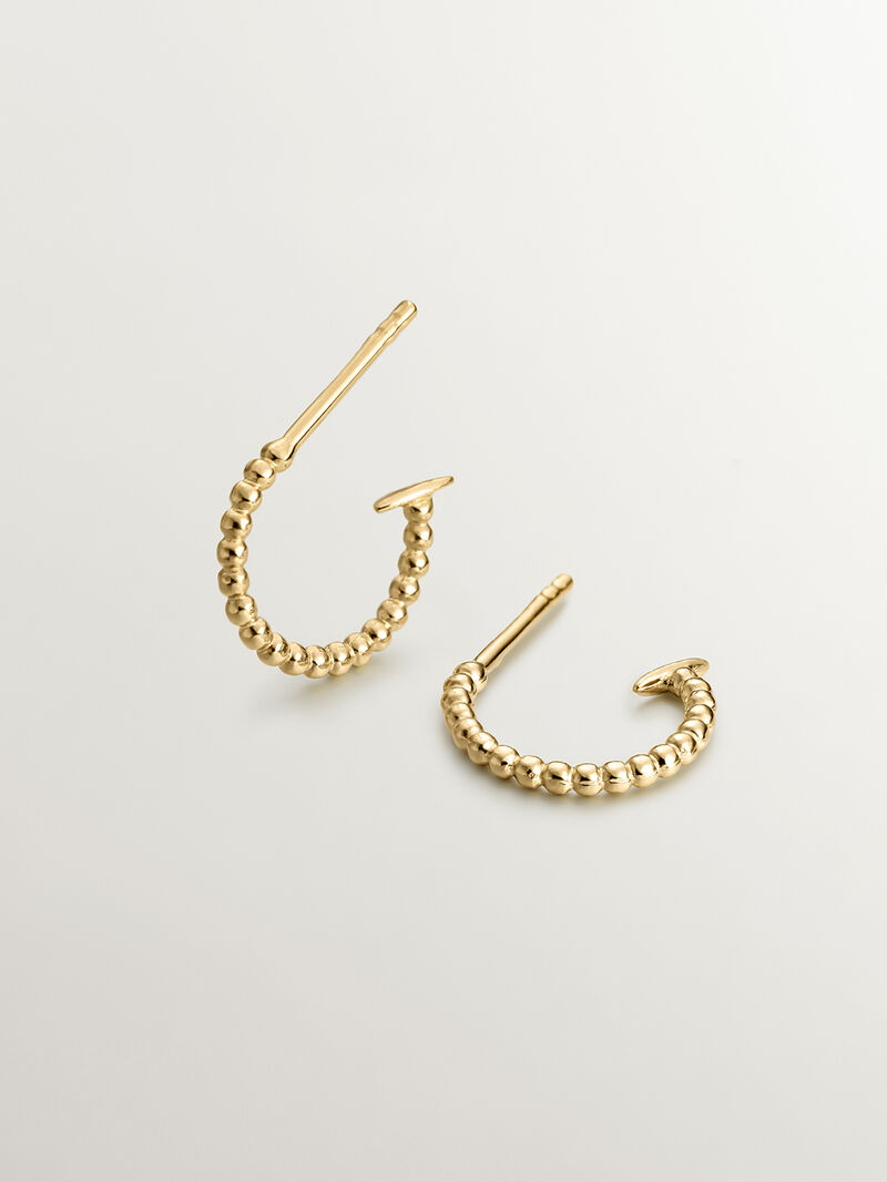 Small hoop earrings made from 925 silver, plated in 18K yellow gold with a ball texture. image number 0