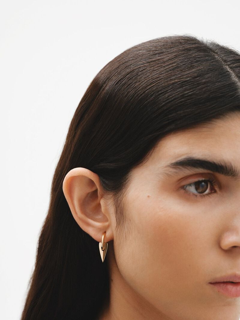 Small hoop earrings made of 925 silver, coated in 18K yellow gold with heart. image number 1