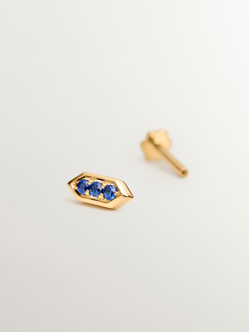 Hexagonal piercing of 18k yellow gold with blue sapphires image number 4