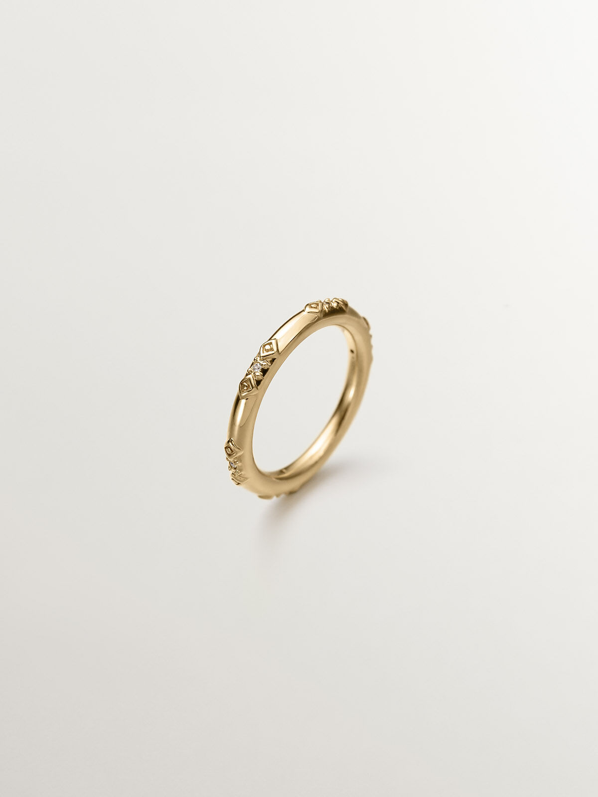 Anillo de plata 925 ba ada en oro amarillo de 18K con topacios