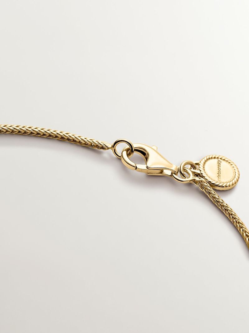 Oval pendant made of 925 silver bathed in 18K yellow gold with relief. image number 6