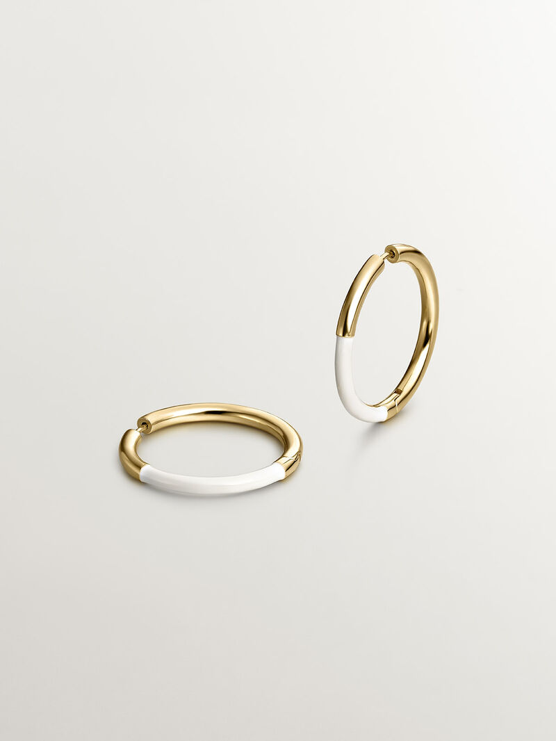 Large hoop earrings made of 925 silver coated in 18K yellow gold with white enamel. image number 2