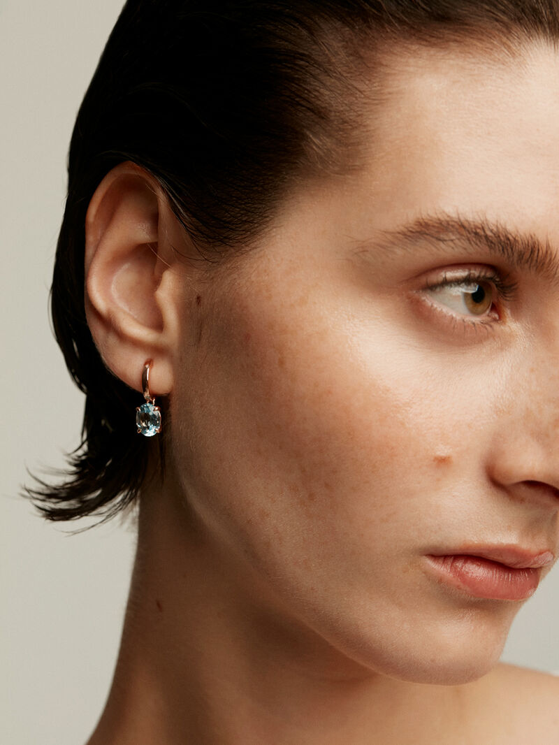 925 Silver earrings plated in 18K rose gold with sky blue topaz. image number 2