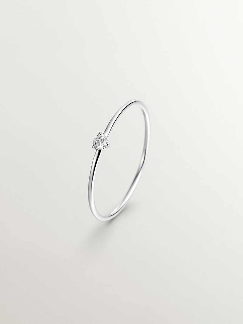 18K white gold solitaire ring with a 0.048ct diamond. image number 0