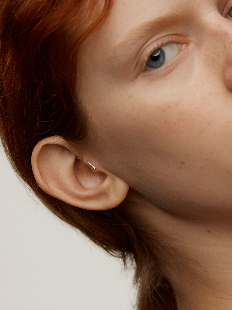 18K white gold piercing line with diamonds. image number 1
