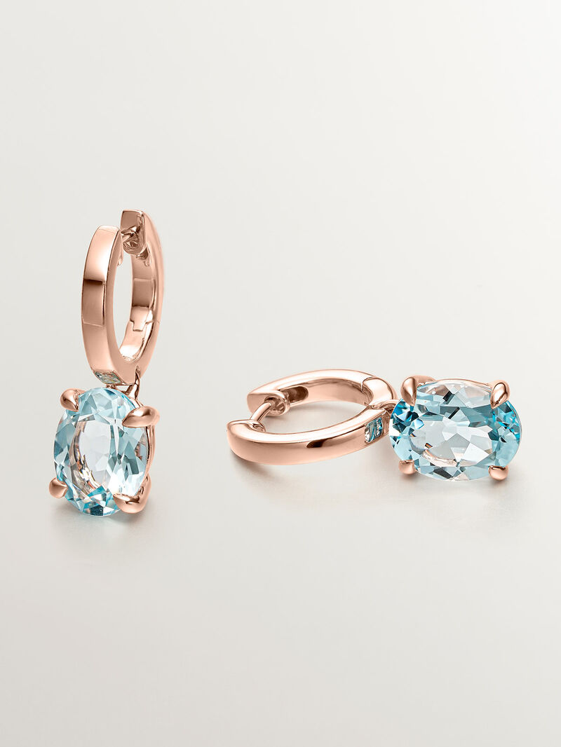 925 Silver earrings plated in 18K rose gold with sky blue topaz. image number 4