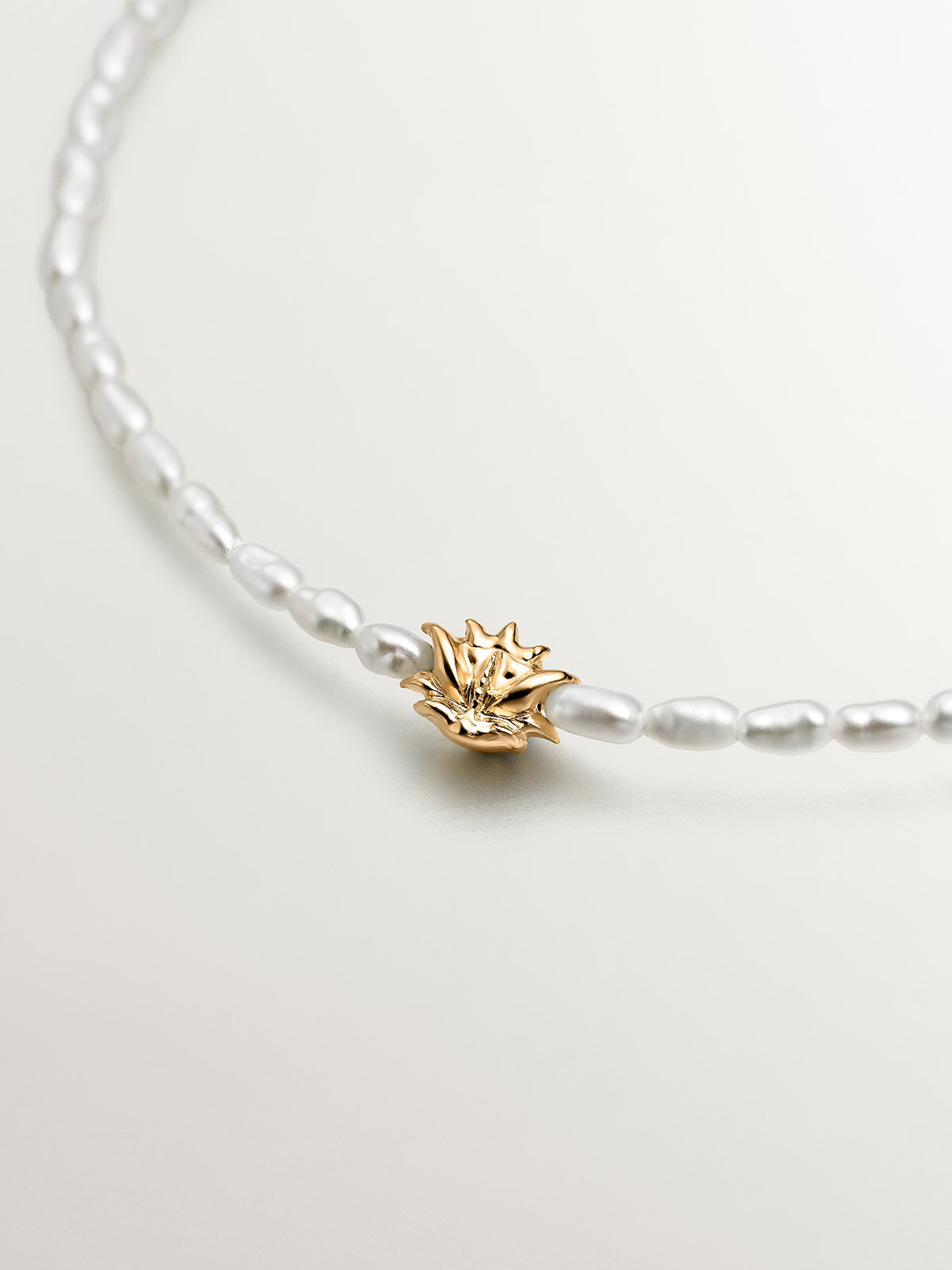 River pearl necklace with 925 silver lotus flower dipped in 18K yellow gold