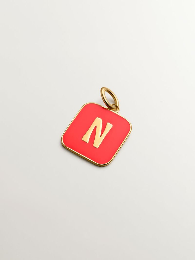 18K yellow gold plated 925 sterling silver charm with N initial and pink enamel in a square shape image number 0