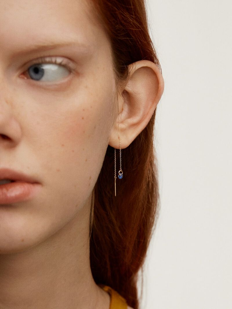 Single 9K yellow gold earring with chain and blue sapphire. image number 1
