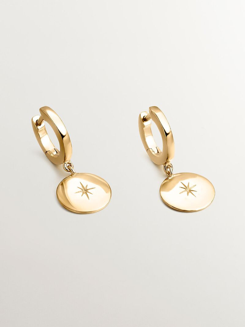 Small 925 silver hoop earrings bathed in 18K yellow gold with engraved star. image number 1
