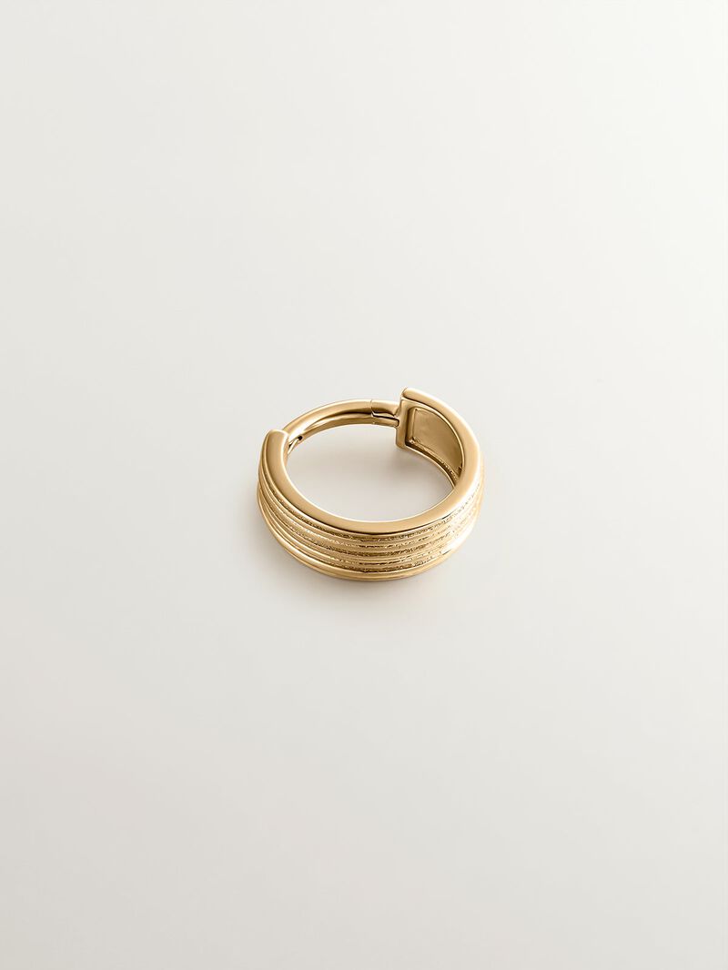Single wide hoop earring made from 9K yellow gold with texture. image number 2