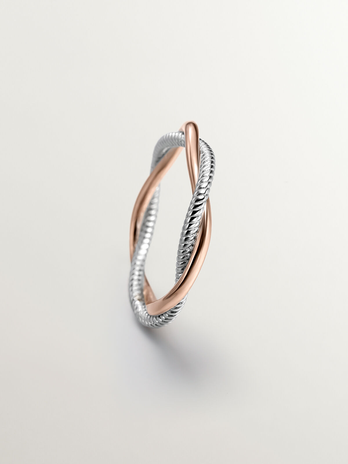 Double twisted ring made of 925 silver bathed in 18K rose gold. Aristocrazy