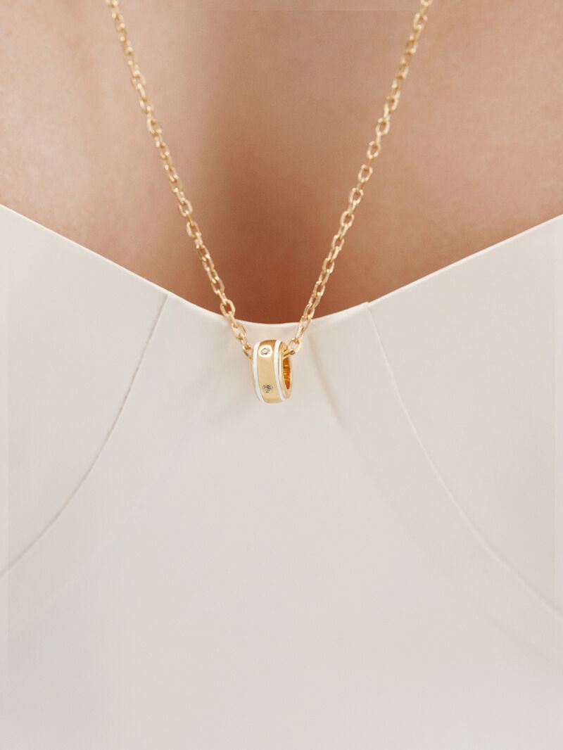18K yellow gold plated 925 silver charm with white topaz and white enamel in a circular shape image number 1