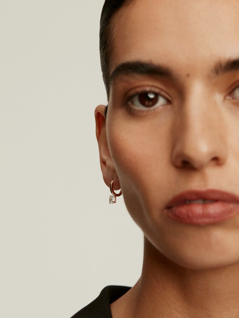925 Silver earrings bathed in 18K rose gold with sky blue topaz image number 1