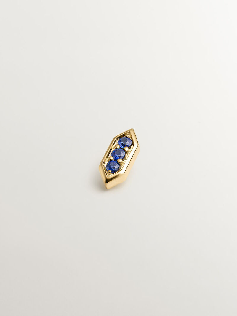 Hexagonal piercing of 18k yellow gold with blue sapphires image number 0