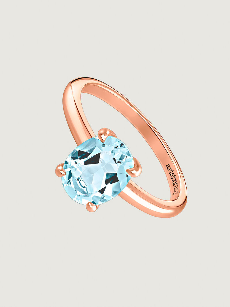 Medium-sized 925 silver hoop earrings plated in 18K rose gold with sky blue topaz. image number 0