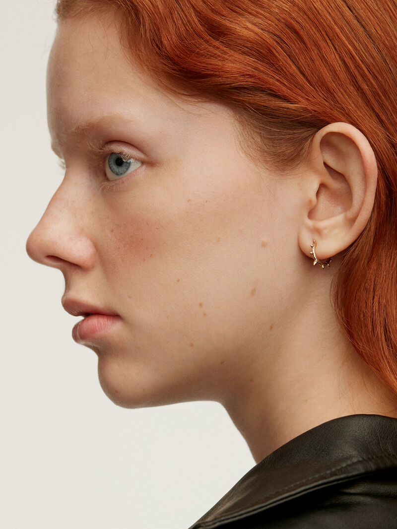 Individual 9K yellow gold hoop earring with spikes. image number 0
