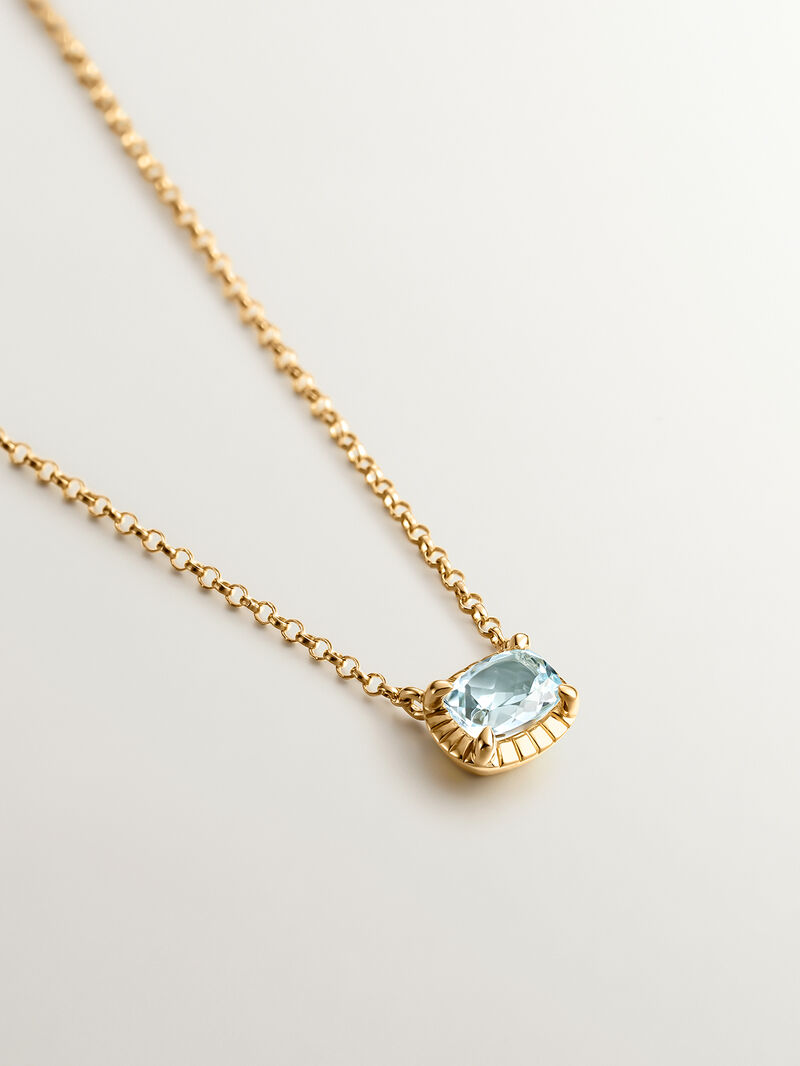 925 Silver pendant bathed in 18K yellow gold with sky blue topaz. image number 2