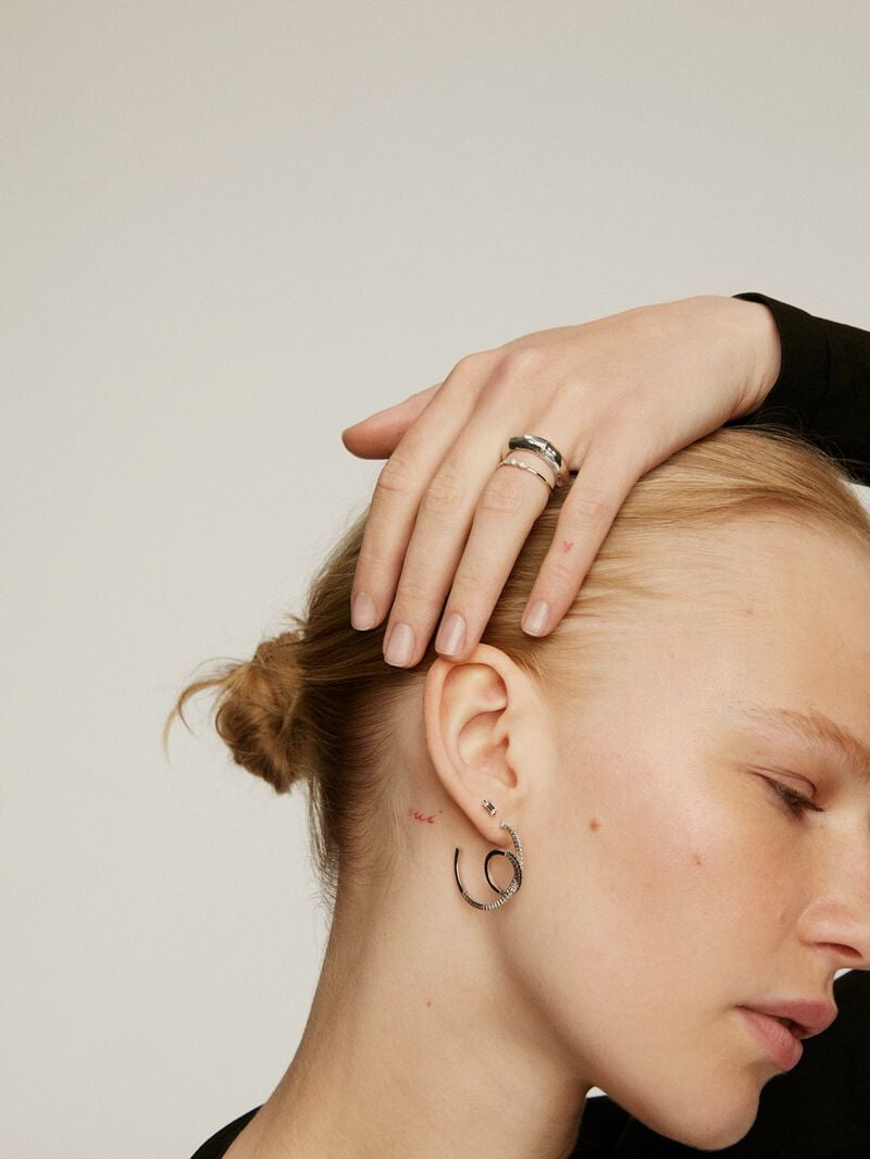 Double hoop earrings made of 925 silver with white topazes and black spinels. image number 5
